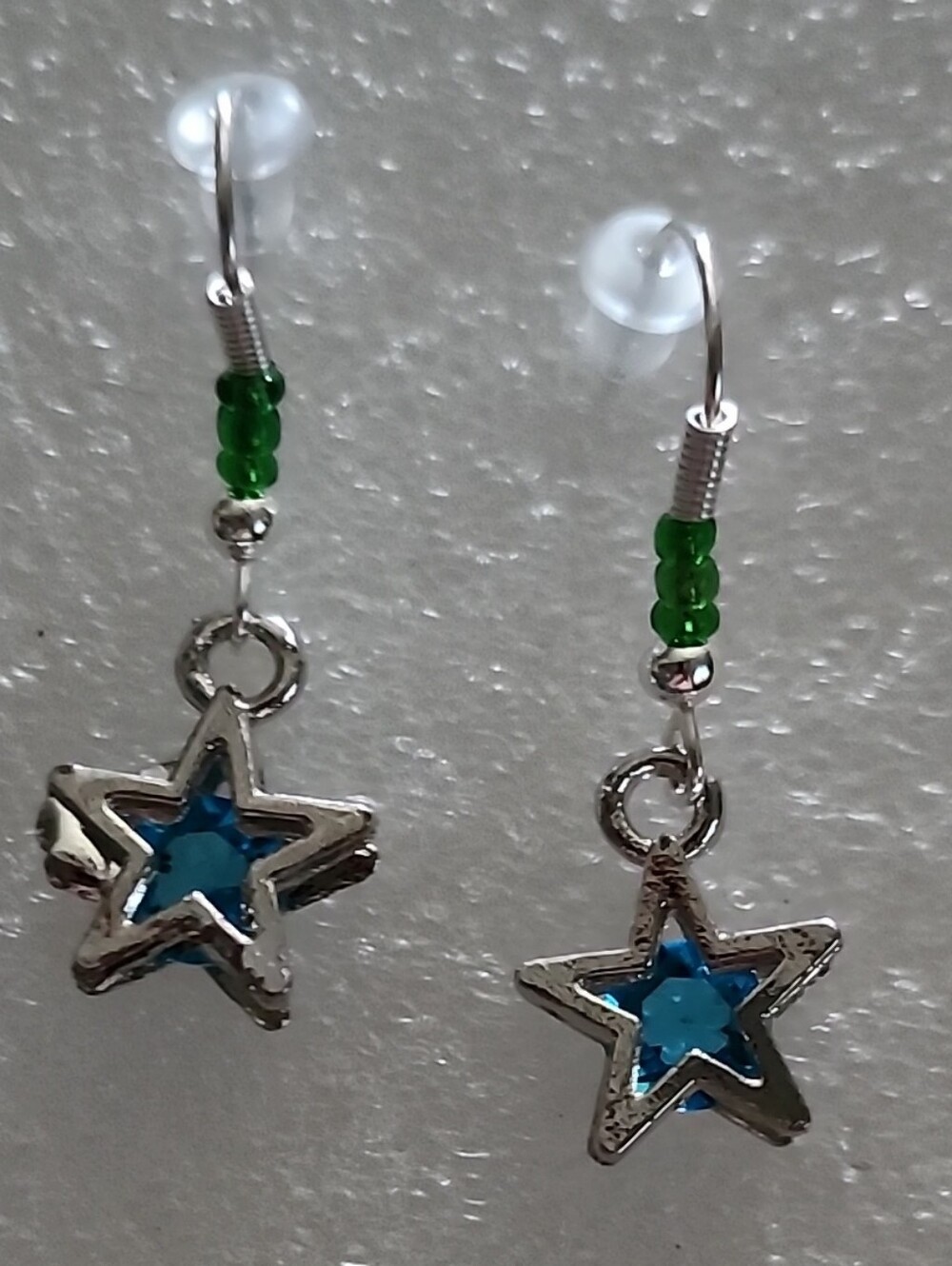 Hand Crafted Silver Star Earrings with Blue Centers and Green Beads